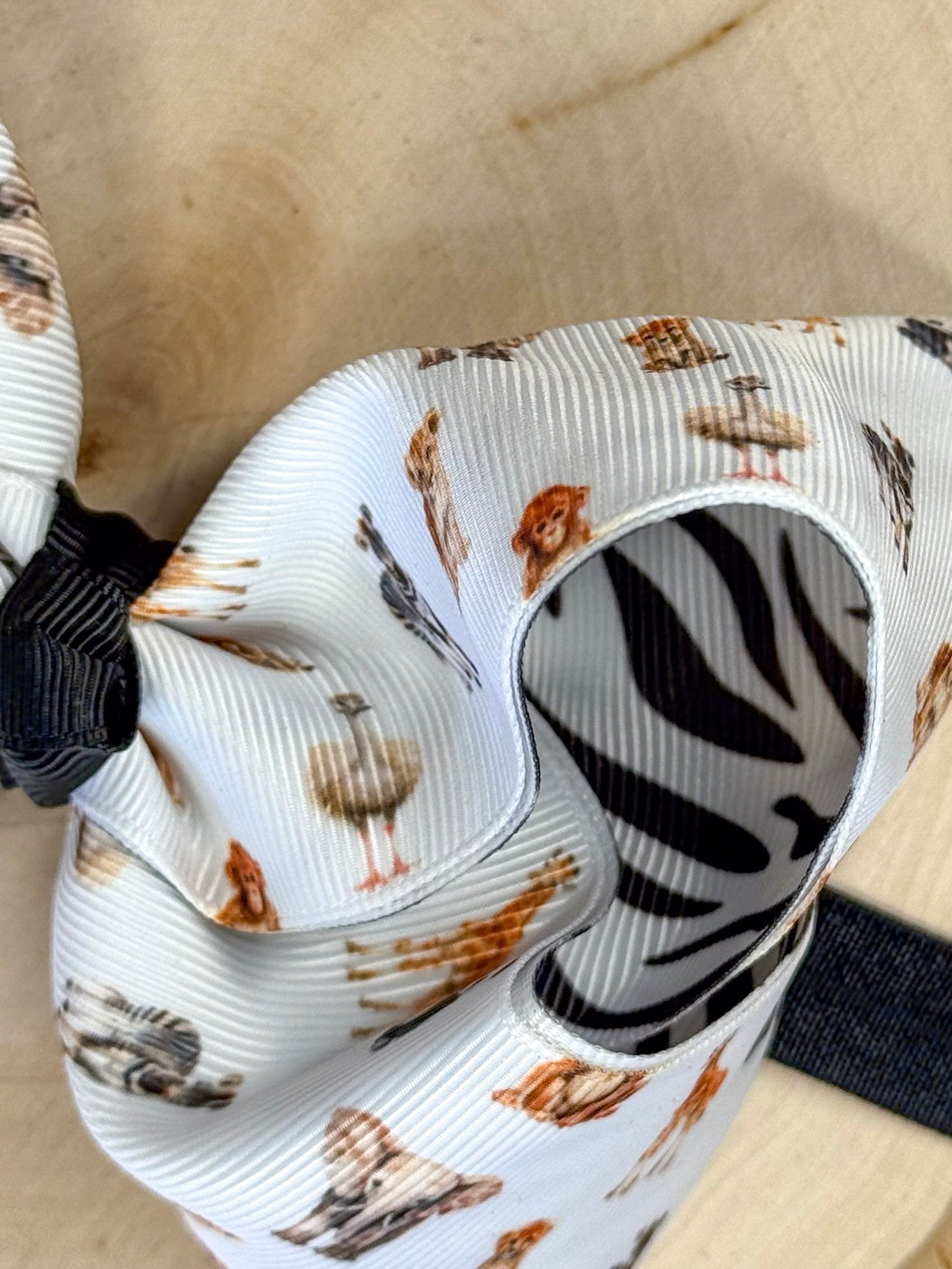 Close-up of a ribbon with animal print on a beige background