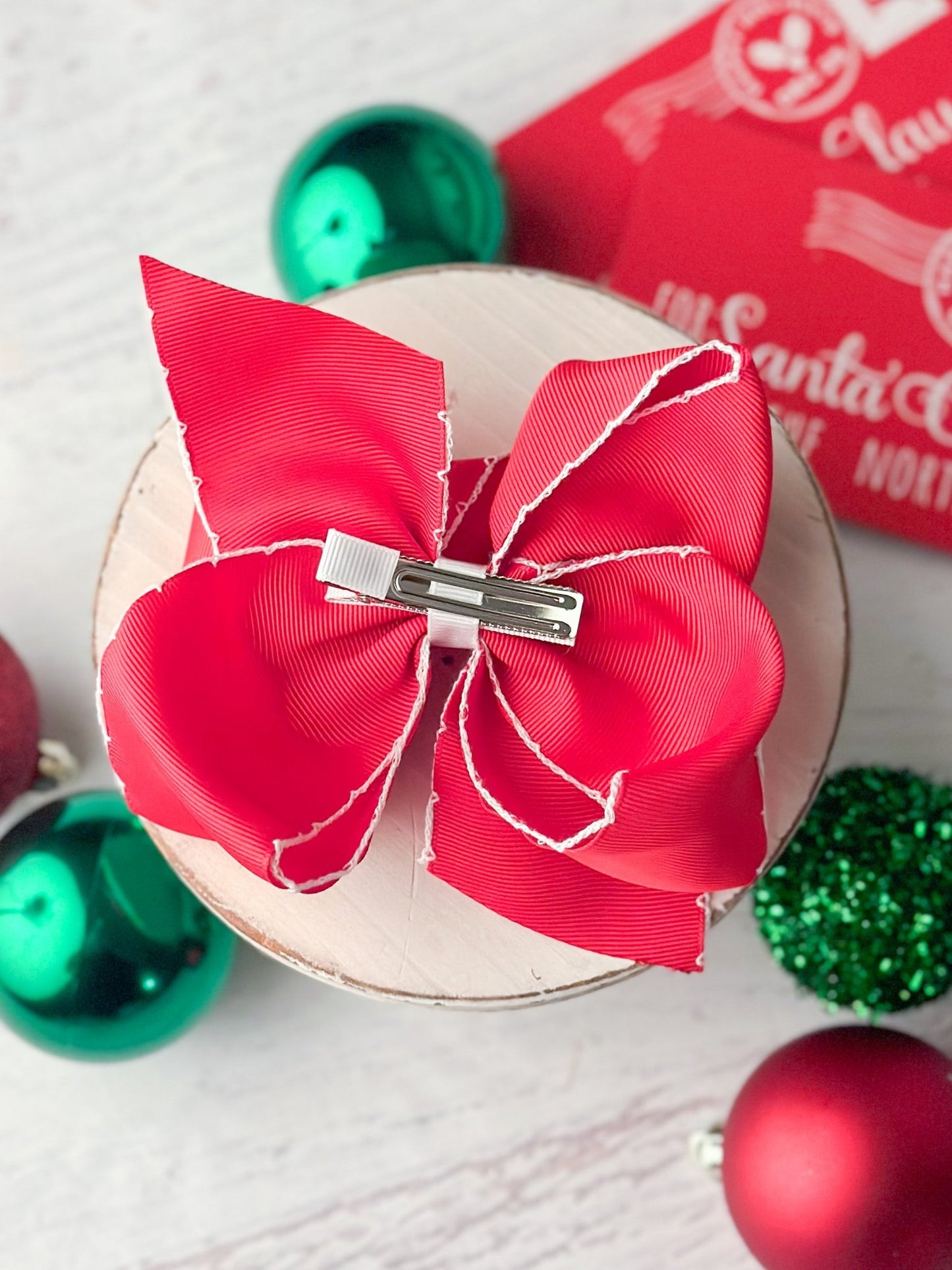 Back of the Santa Embroidered Hair Bow showing alligator clip