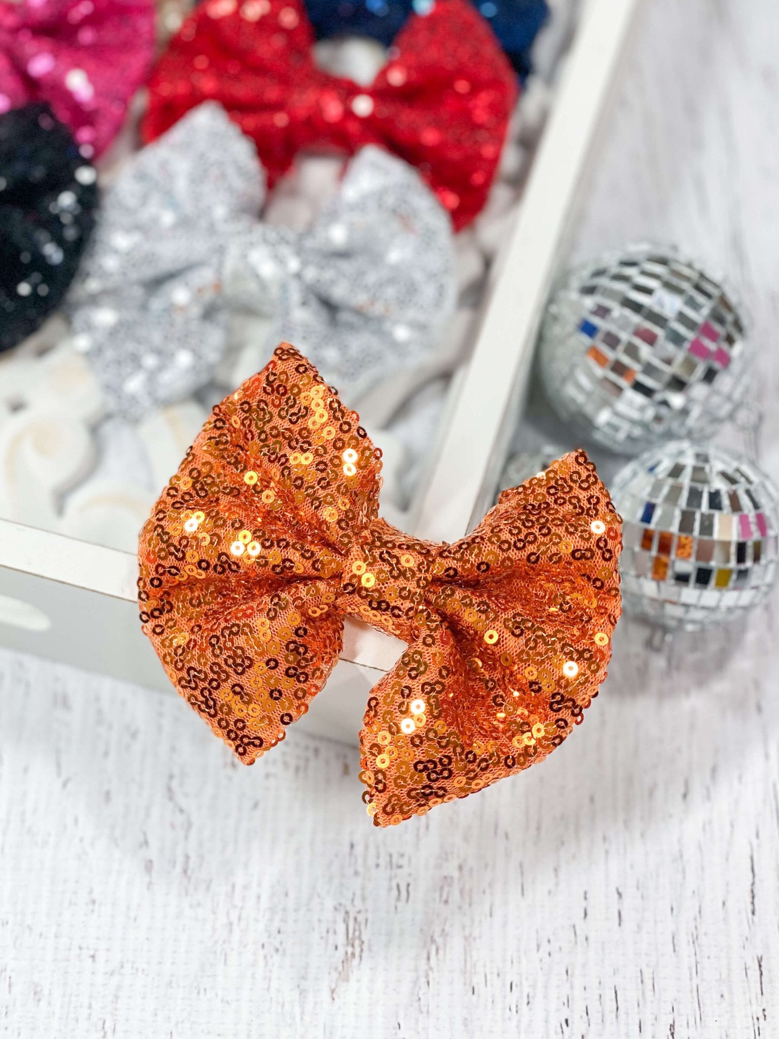 orange sequin hair bow