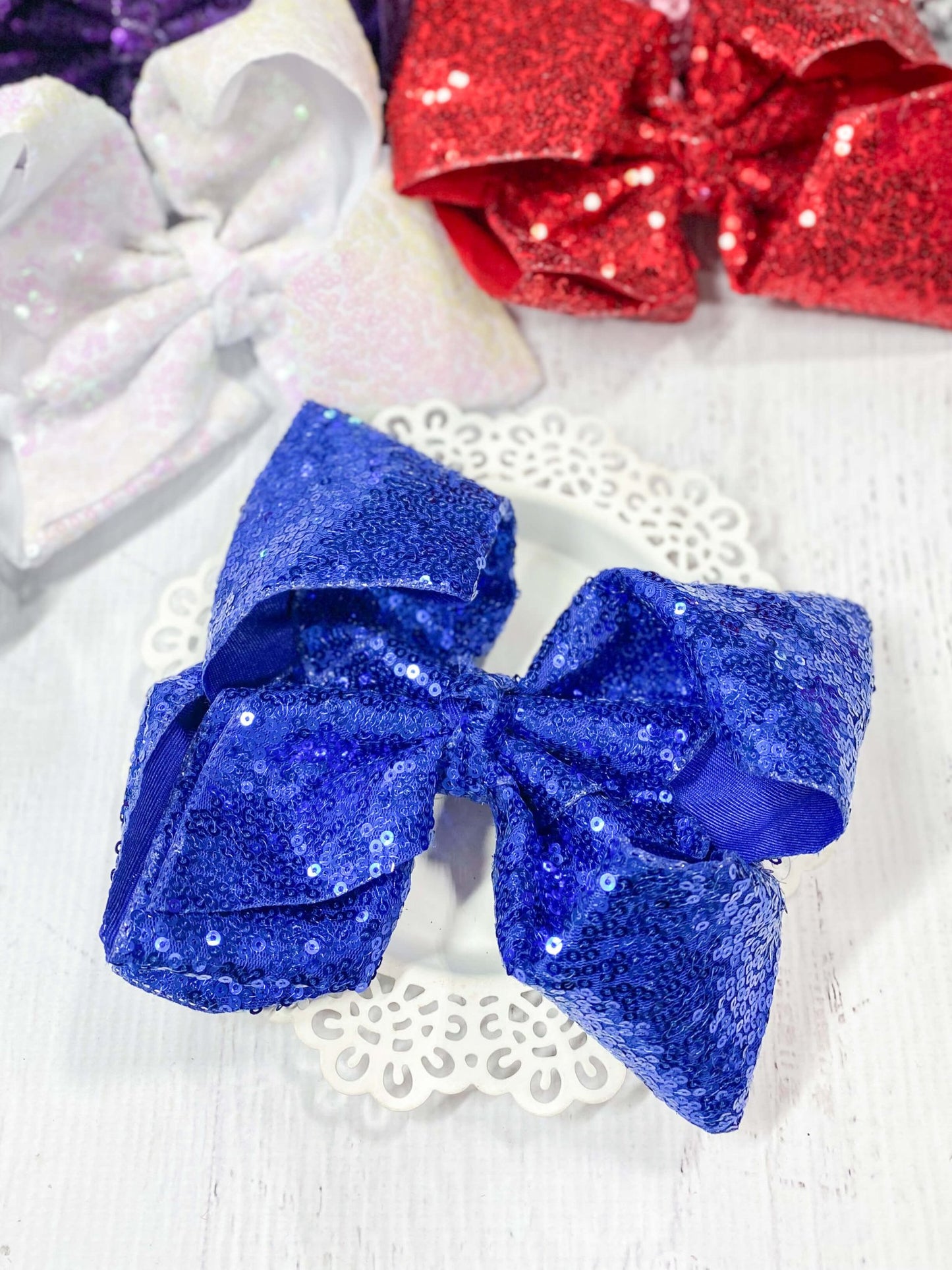 royal blue texas size sequin bow