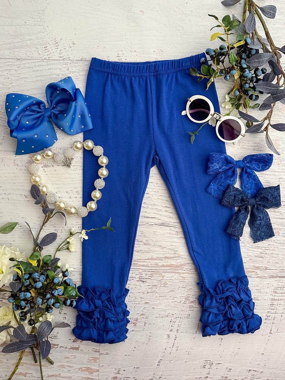 Royal blue ruffled icing leggings