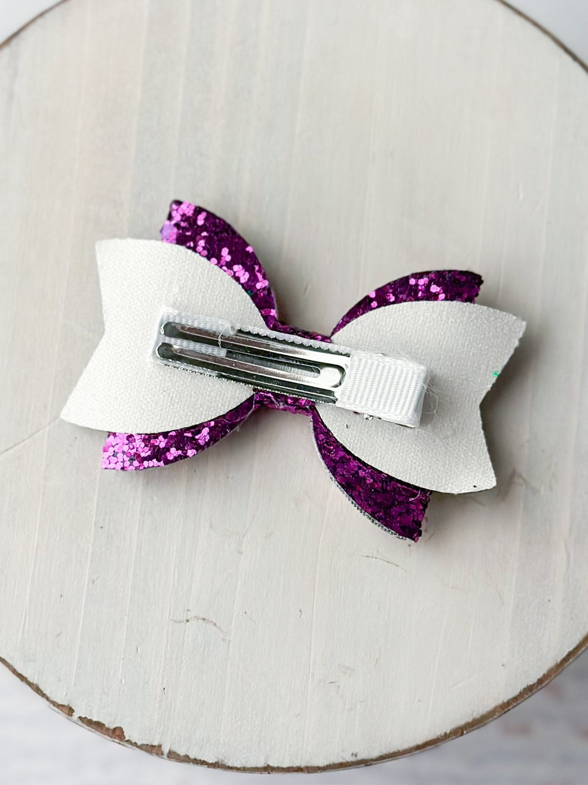 Back of sparkly mermaid clippie showing double prong alligator clip