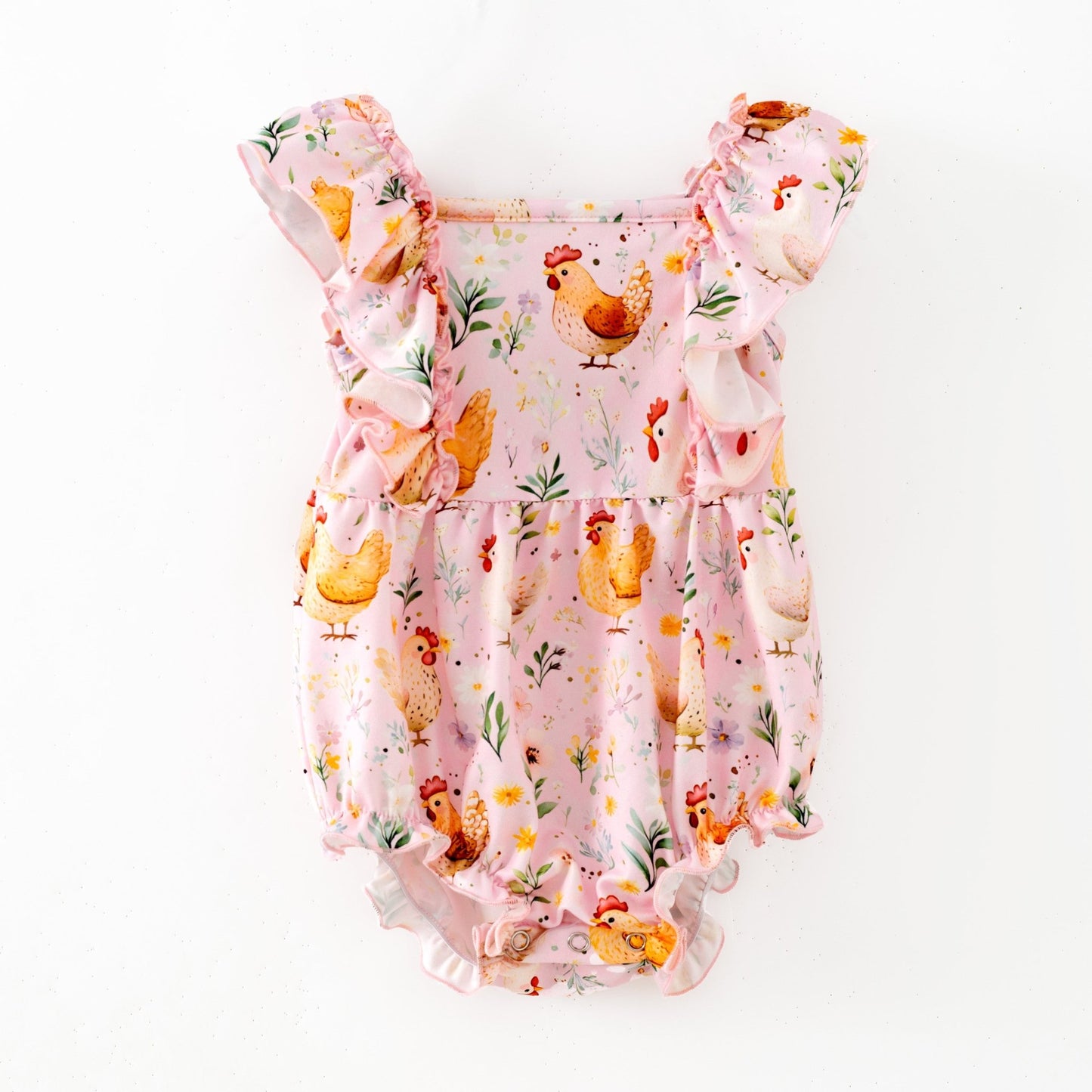 Boutique infant romper featuring pastel chicken and floral pattern