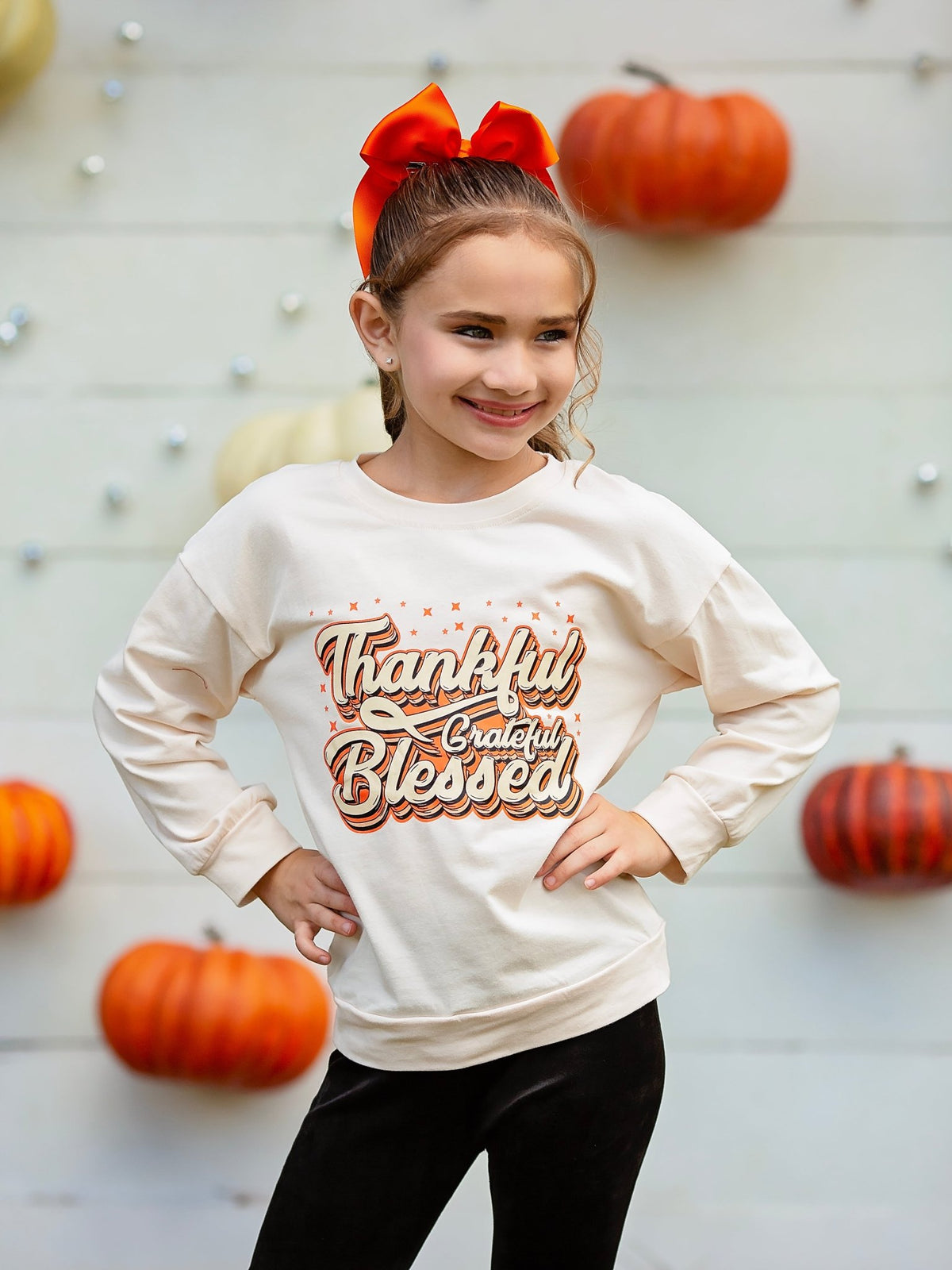 Girl wearing the Thankful Grateful Blessed shirt