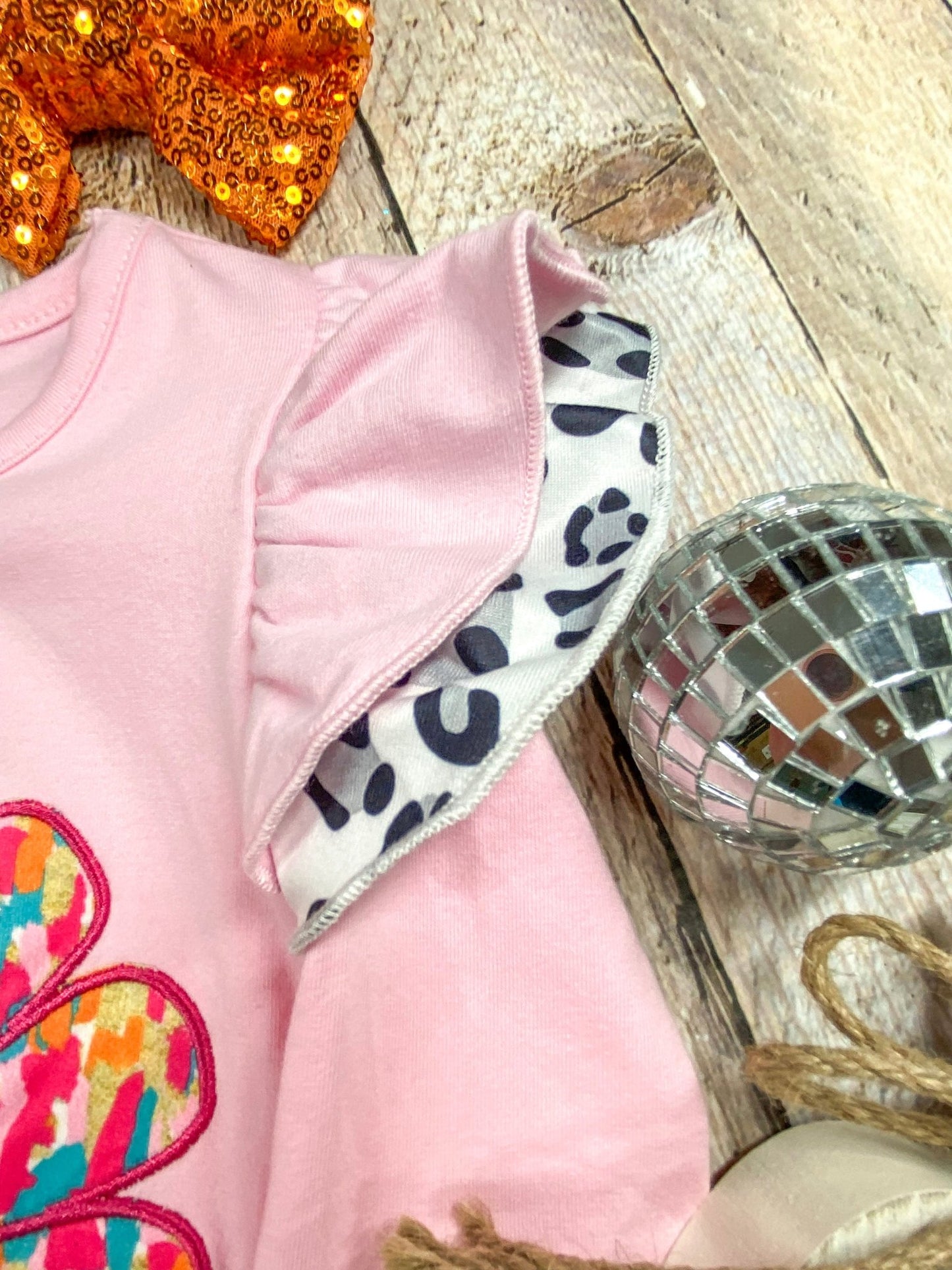 close up of ruffles on shoulder