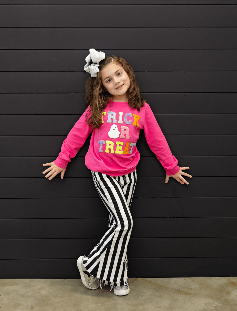 Model wearing the Trick or Treat Pink Chenille Sweater