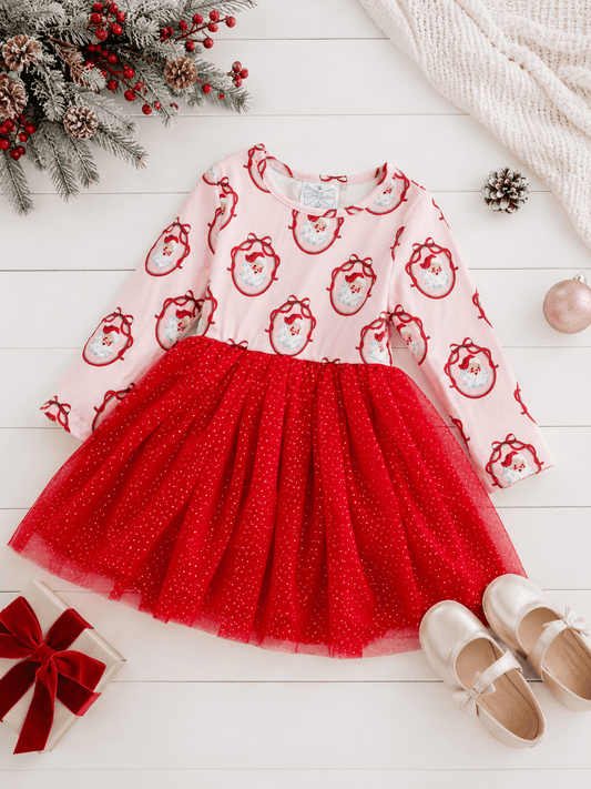 Girls Vintage Santa Christmas tutu dress styled in a festive holiday flatlay with a classic Santa print, glitter red tulle skirt, and coordinating Christmas accessories. - Alternative view