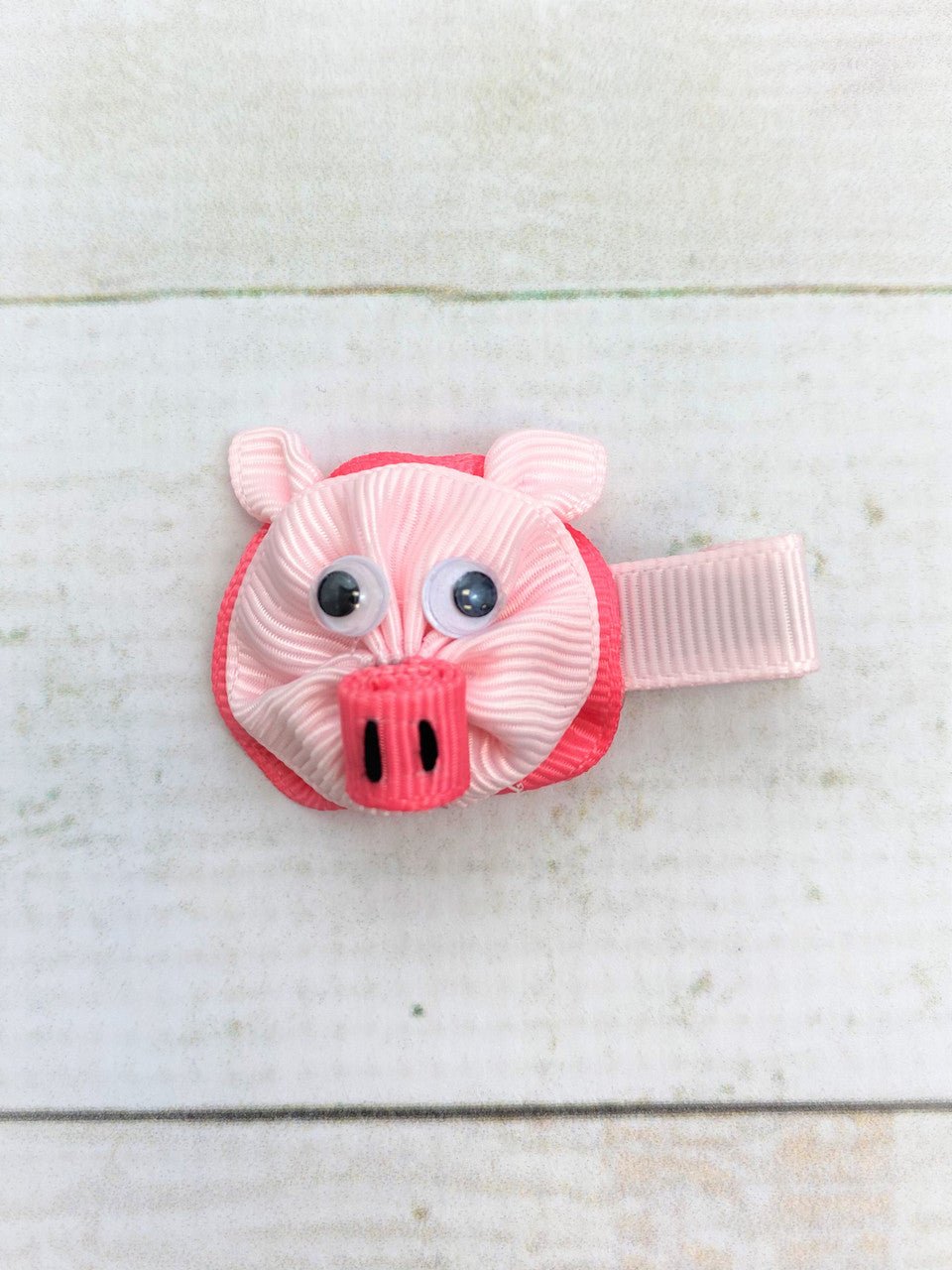 pig clippie on wood