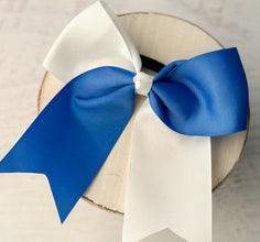 Bright blue and white school spirit hair bow for pep rallies