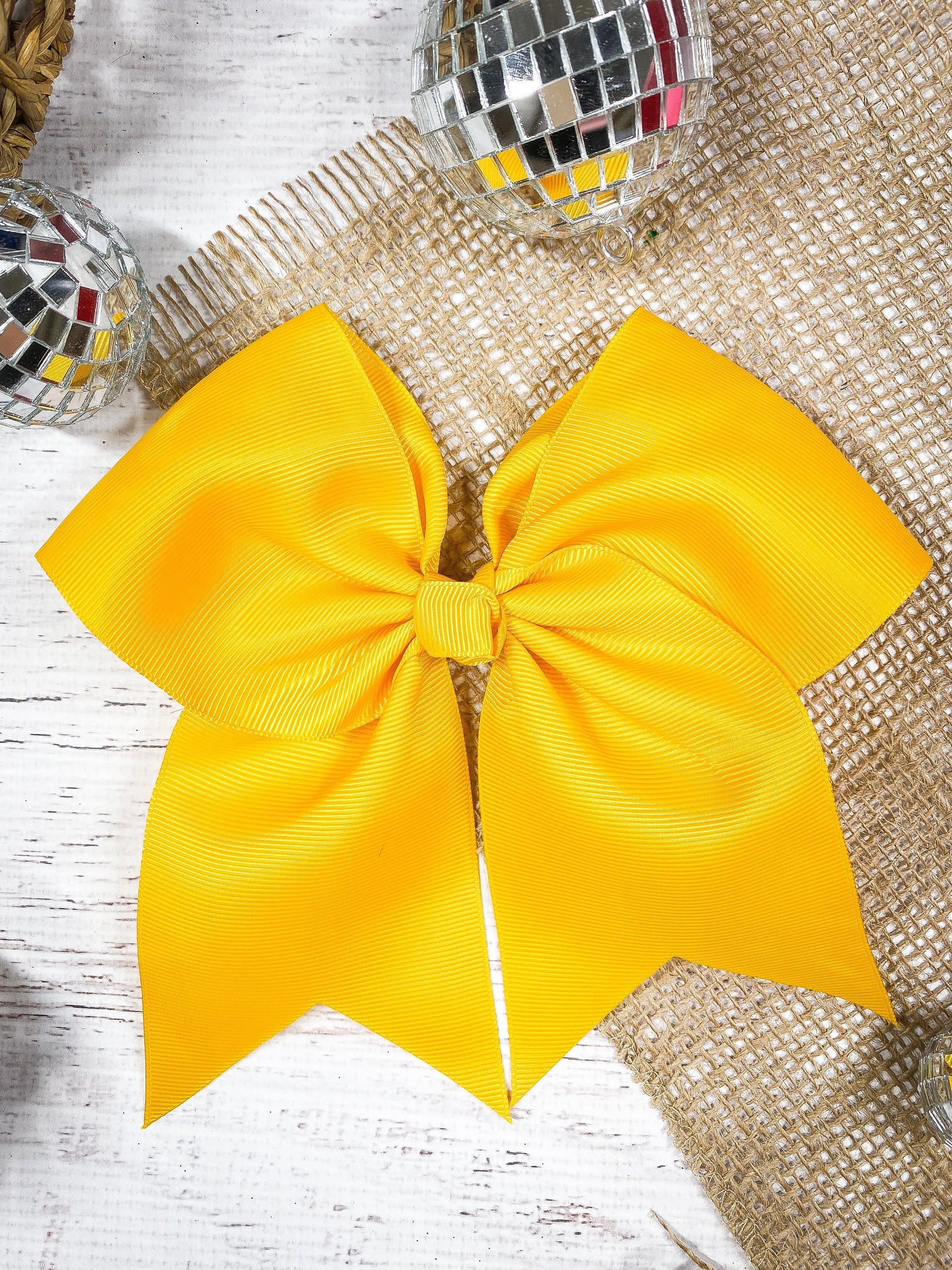 Solid Color Bows for sale - yellow bow on decorative background