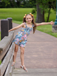 model wearing Chasing Butterflies Romper