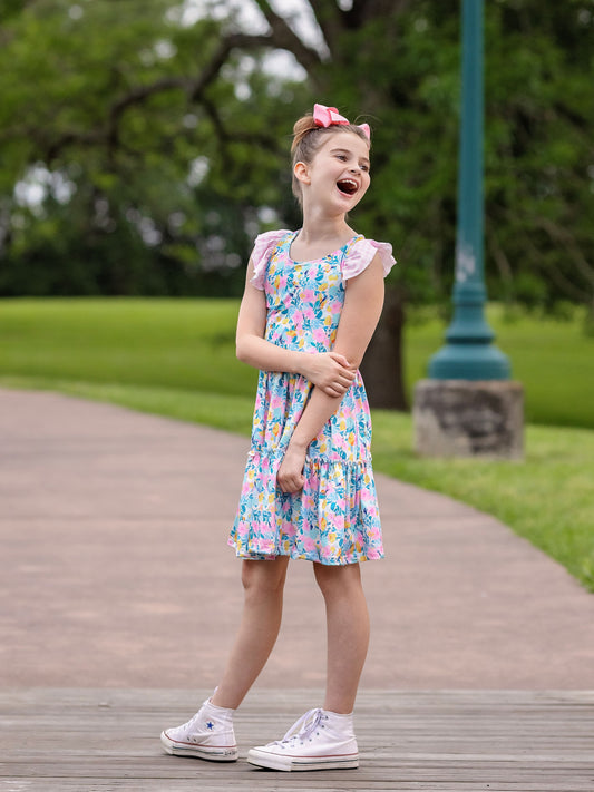 model wearing Bright Floral Tiered Twirl Dress