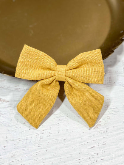 mustard linen fabric hair bow