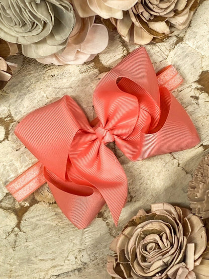 4.5 inch coral grosgrain hair bow on satin headband