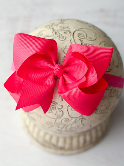 4.5 inch hot pink grosgrain hair bow on satin headband