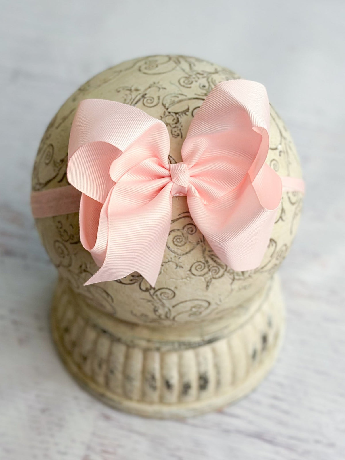 4.5 inch light pink grosgrain hair bow on satin headband