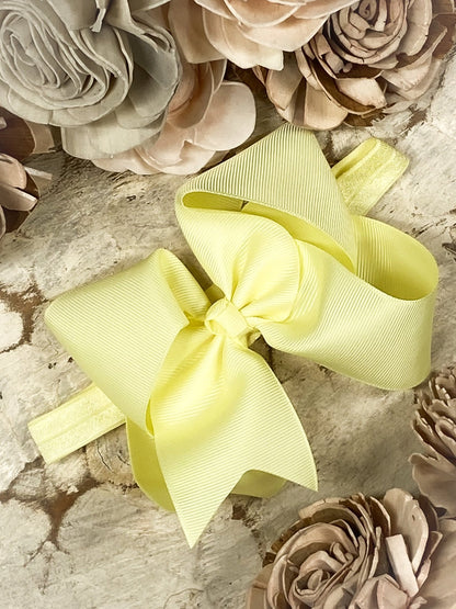 4.5 inch light yellow grosgrain hair bow on satin headband