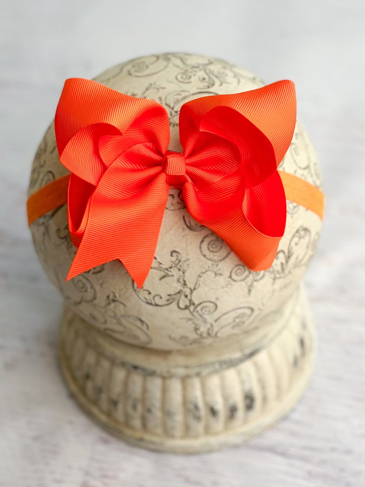 4.5 inch orange grosgrain hair bow on satin headband