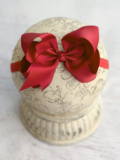 4.5 inch red grosgrain hair bow on satin headband