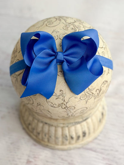4.5 inch royal blue grosgrain hair bow on satin headband