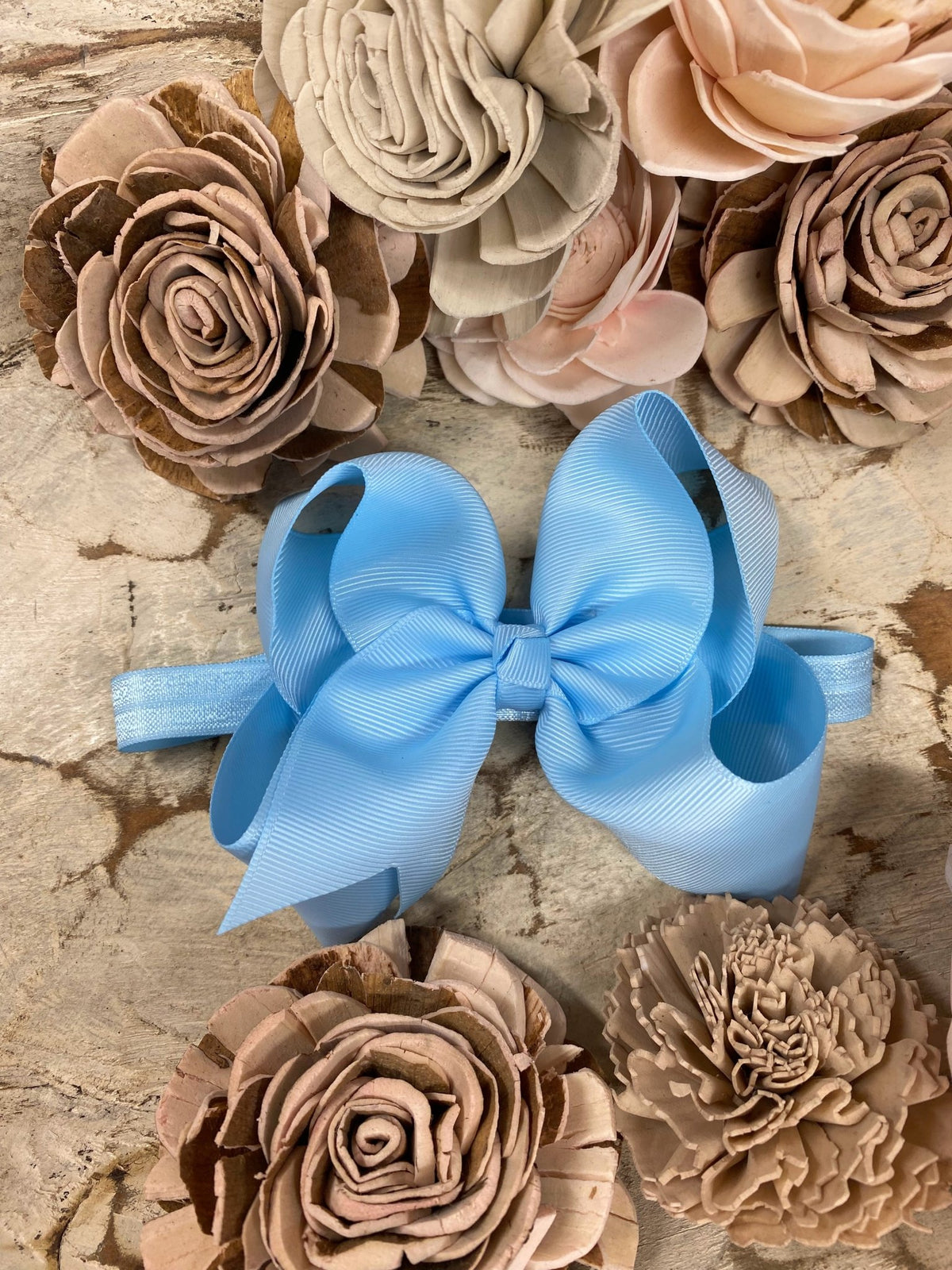 4.5 inch sky blue grosgrain hair bow on satin headband