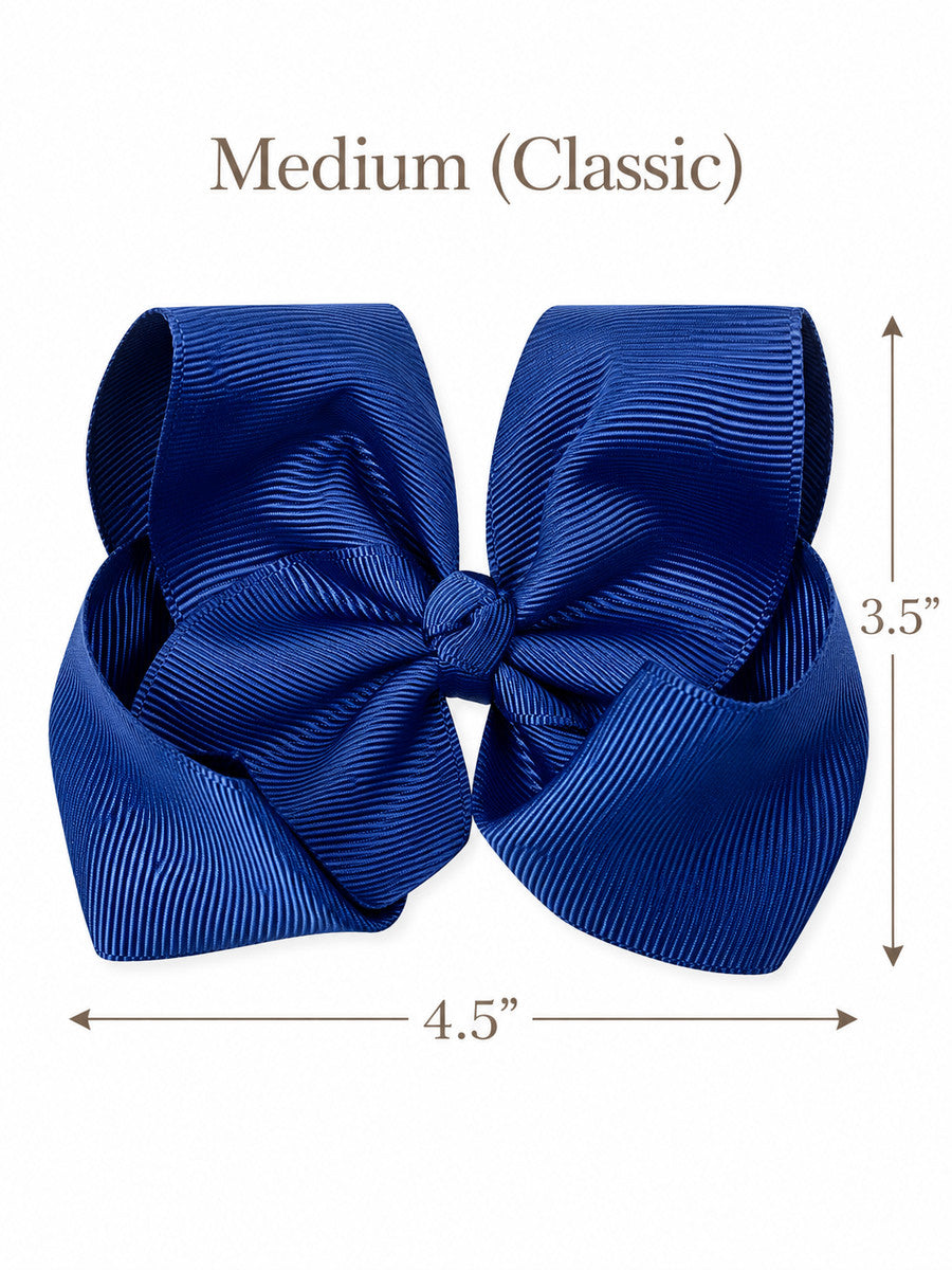 Size guide for our 4.5 inch classic grosgrain hair bow with measurements