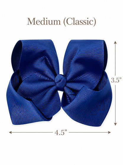 Size guide for our 4.5 inch classic grosgrain hair bow with measurements