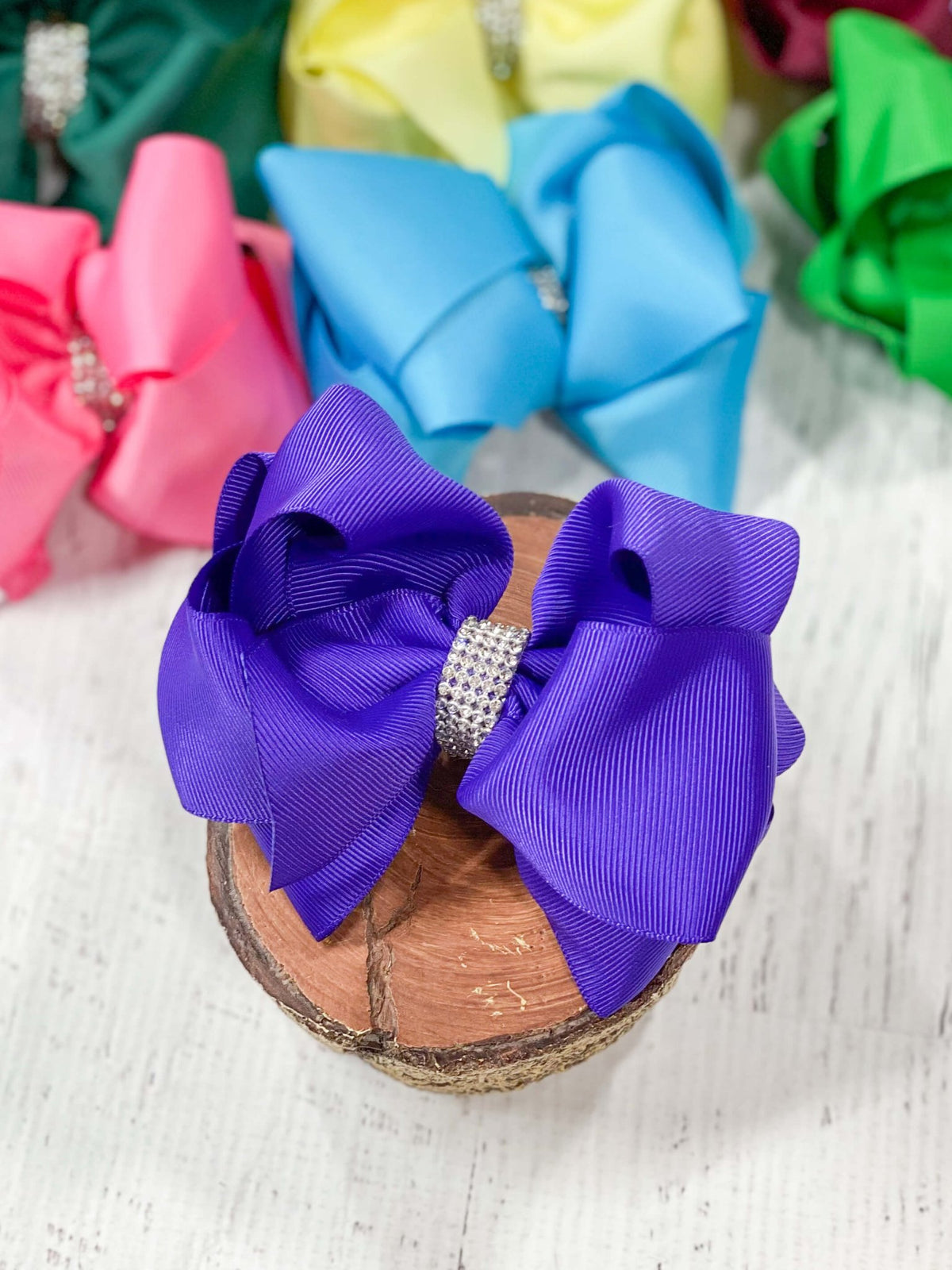 4.5 inch regal purple classic rhinestone center hair bow