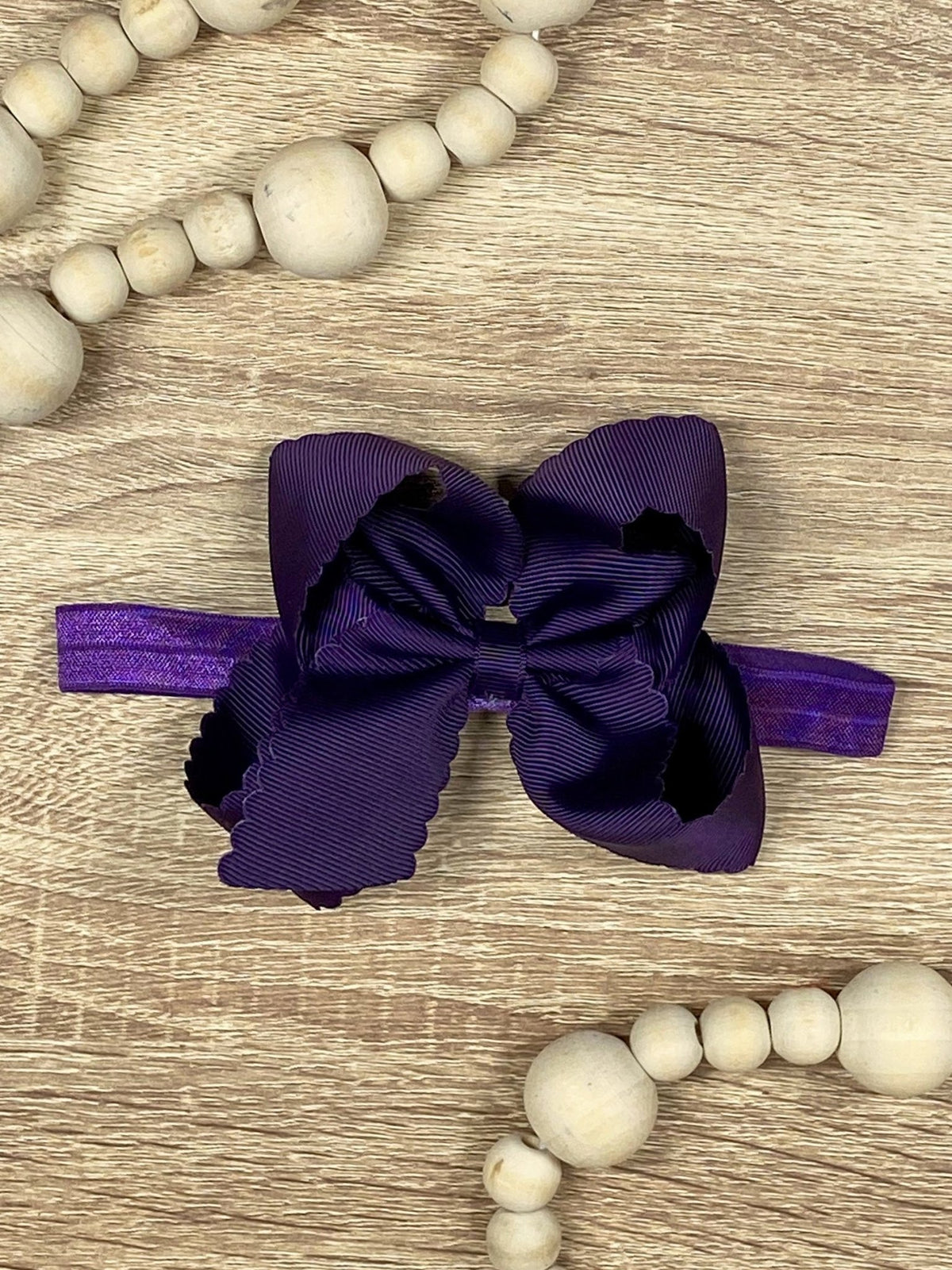 4.5 inch eggplant classic scalloped hair bow on satin headband