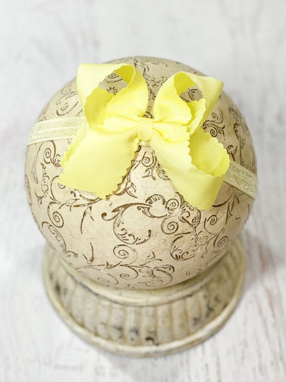 4.5 inch light yellow classic scalloped hair bow on satin headband