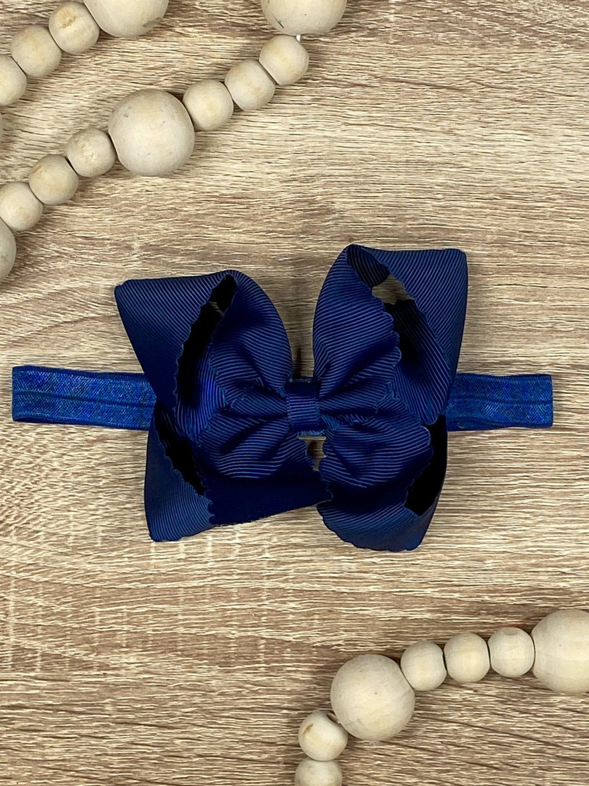 4.5 inch navy classic scalloped hair bow on satin headband