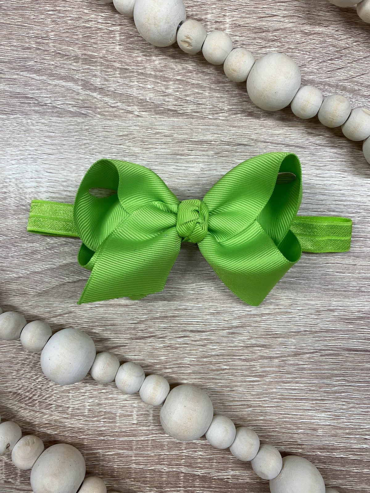 4 inch lime green essential grosgrain hair bow on satin headband