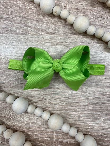 4 inch lime green essential grosgrain hair bow on satin headband
