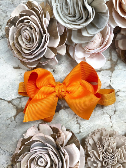 4 inch orange essential grosgrain hair bow on satin headband
