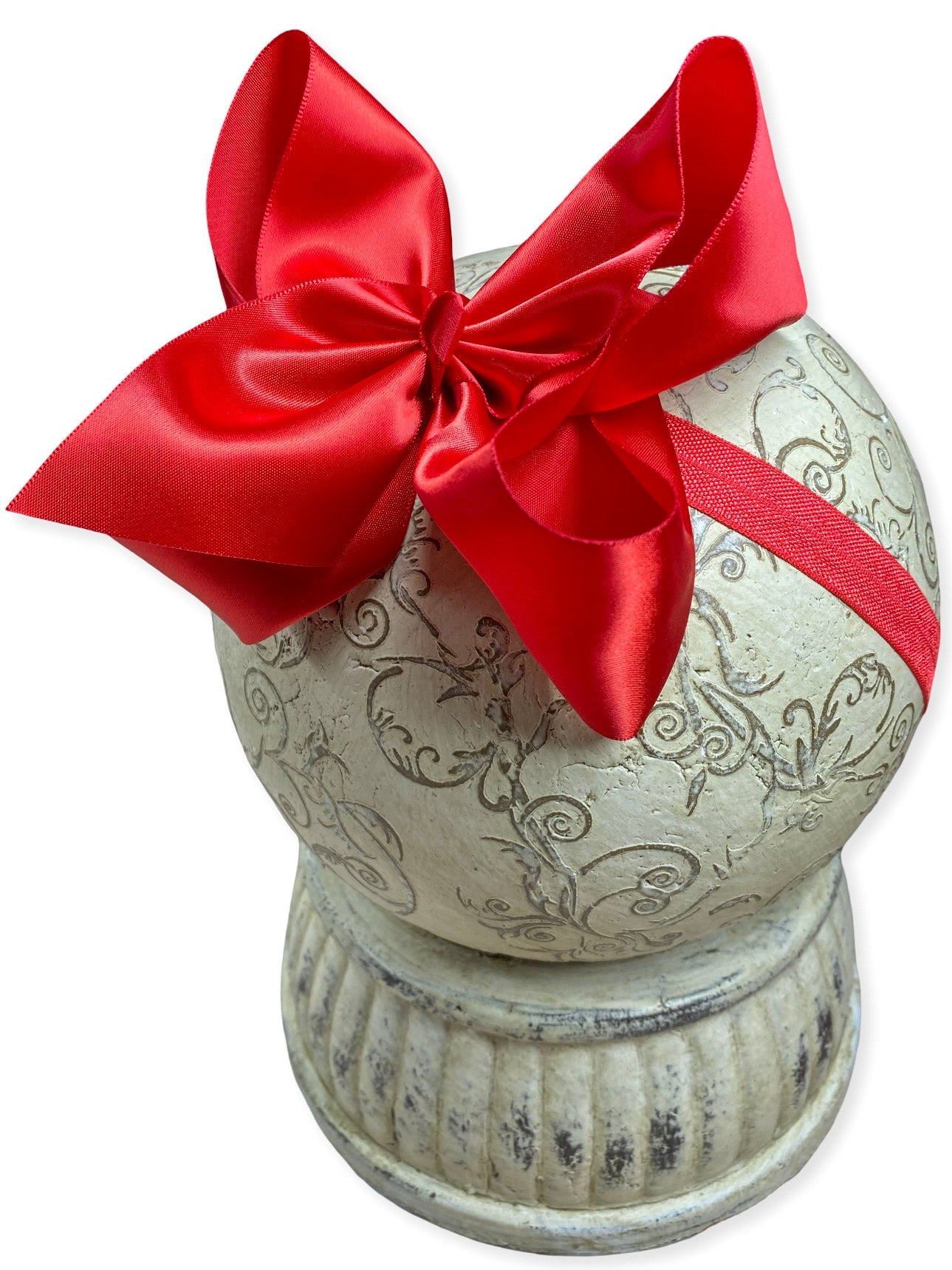  large red satin bow on a white background