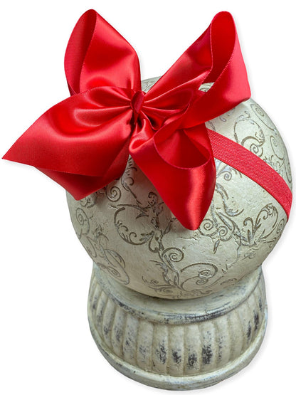  large red satin bow on a white background