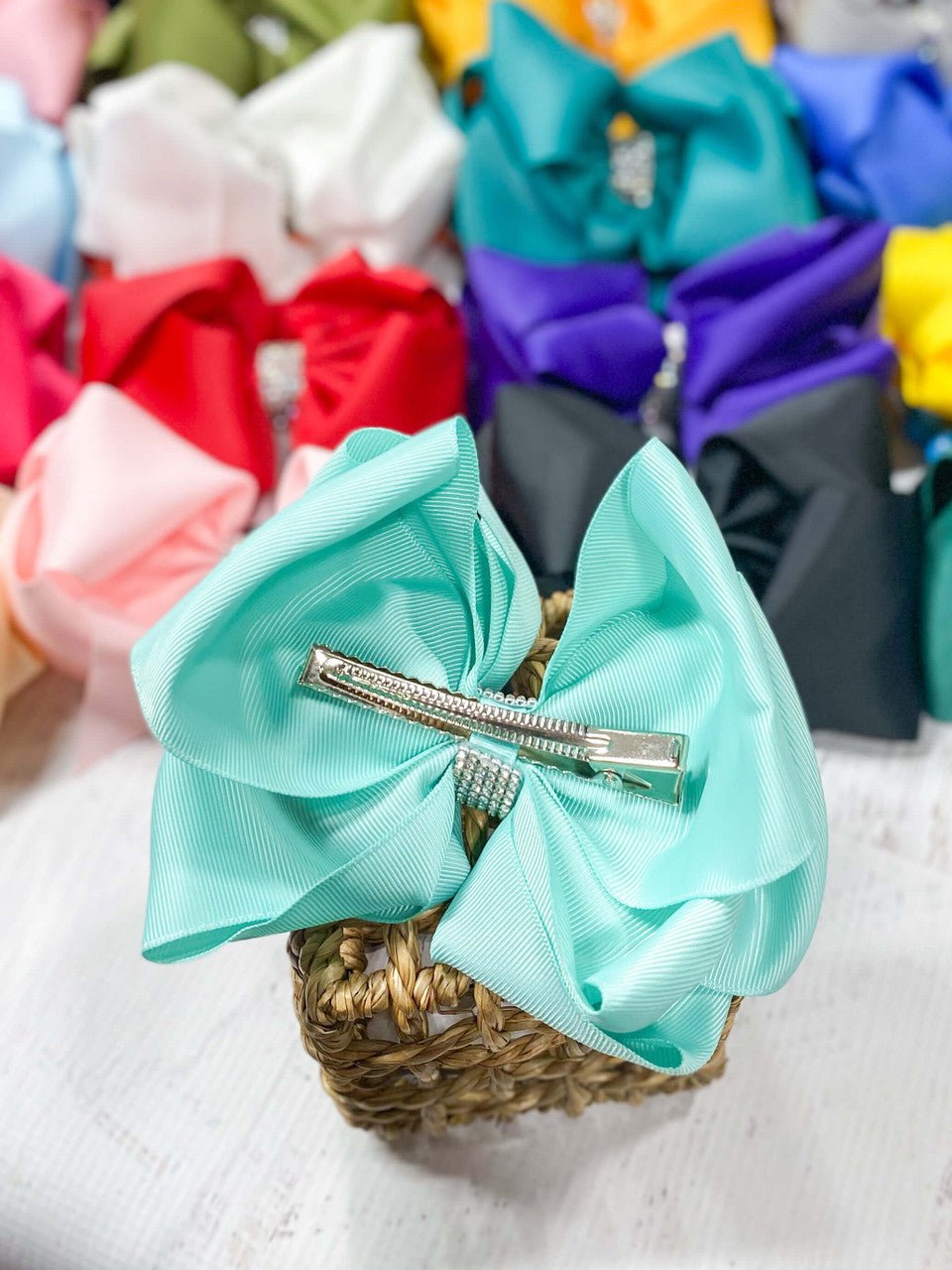 Back of 5.5 inch oversize rhinestone center knot hair bows