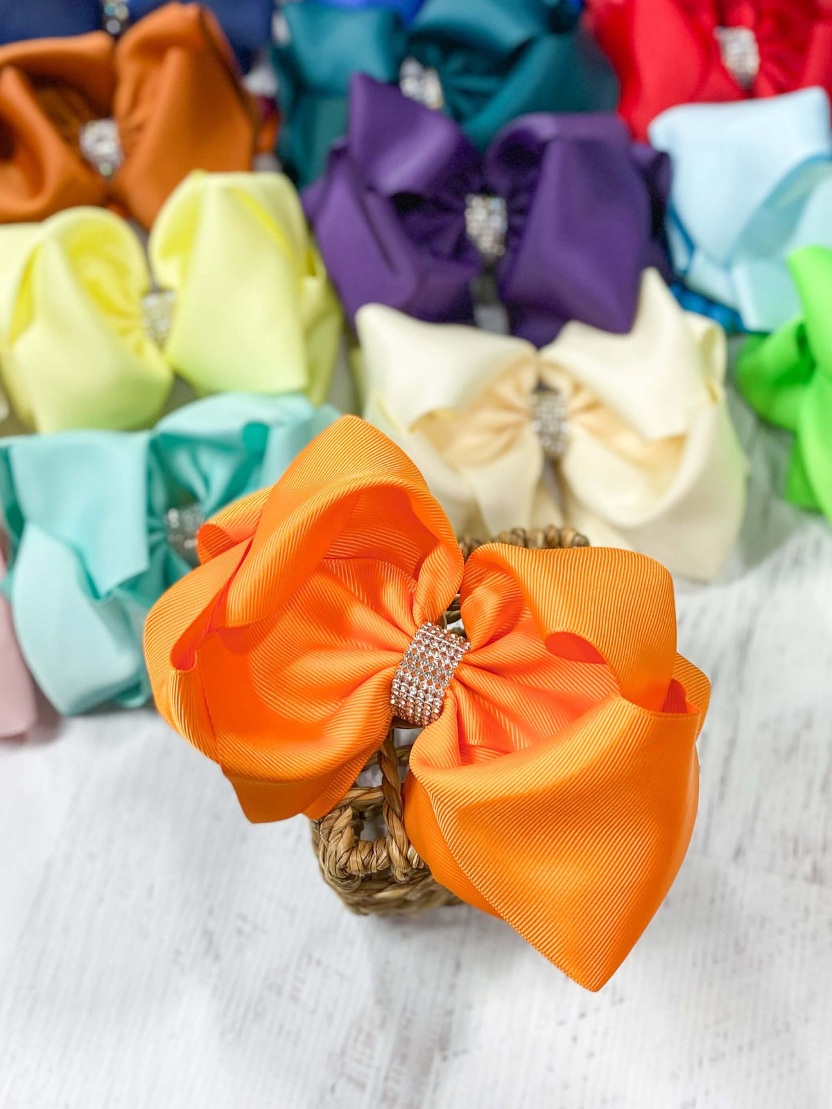 5.5 inch orange oversize rhinestone center knot hair bow
