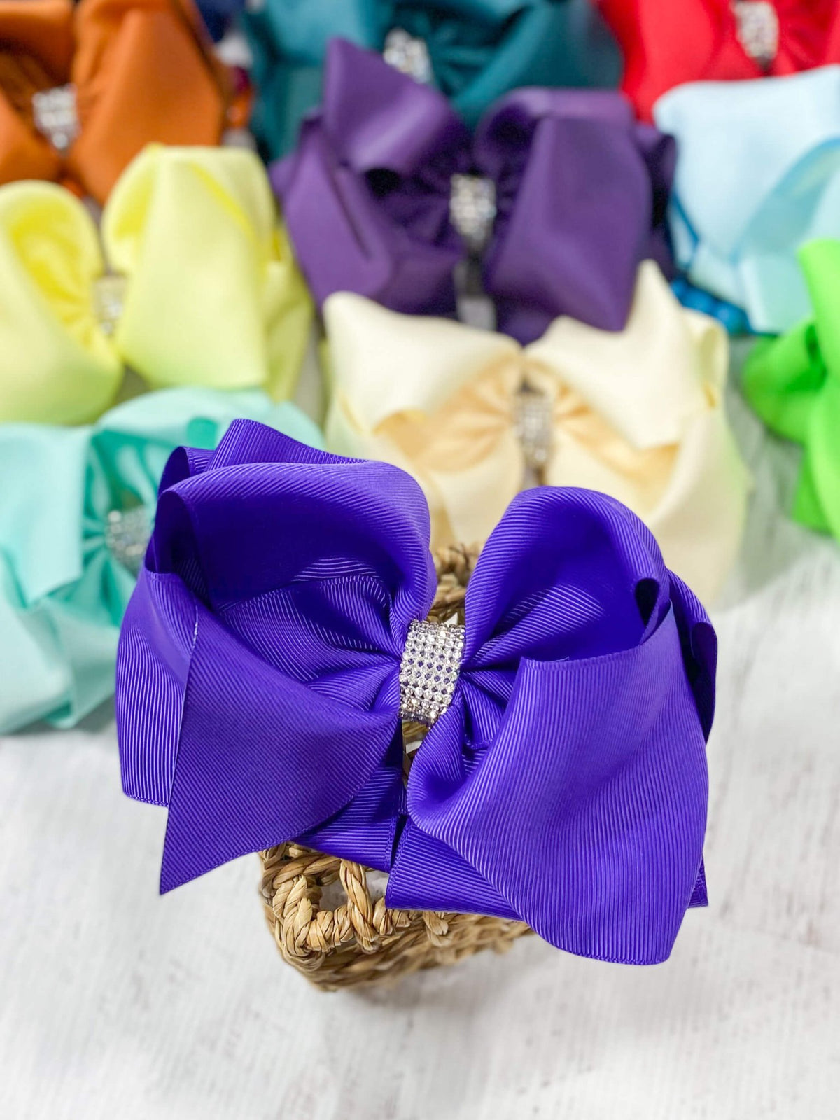 5.5 inch regal purple oversize rhinestone center knot hair bow