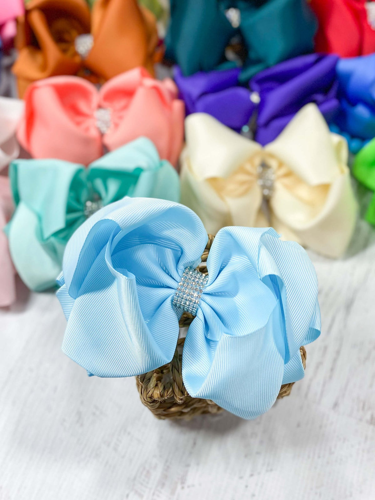 5.5 inch sky blue oversize rhinestone center knot hair bow
