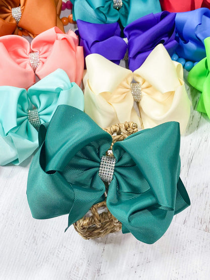 5.5 inch teal oversize rhinestone center knot hair bow