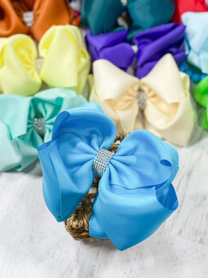 5.5 inch turquoise oversize rhinestone center knot hair bow