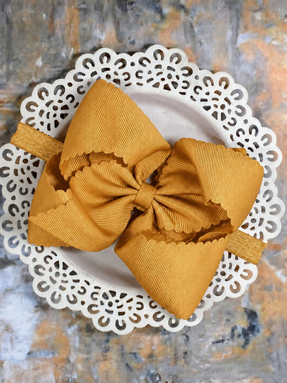 5.5 inch gold oversize scalloped hair bow on satin headband
