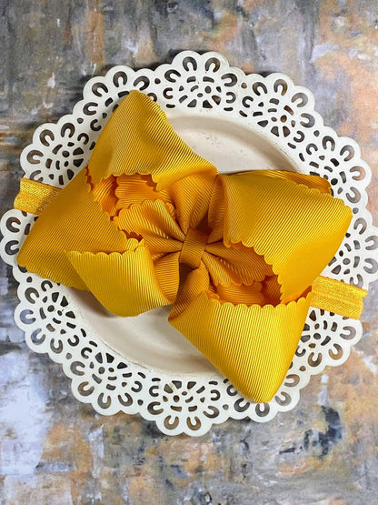 5.5 inch mustard oversize scalloped hair bow on satin headband