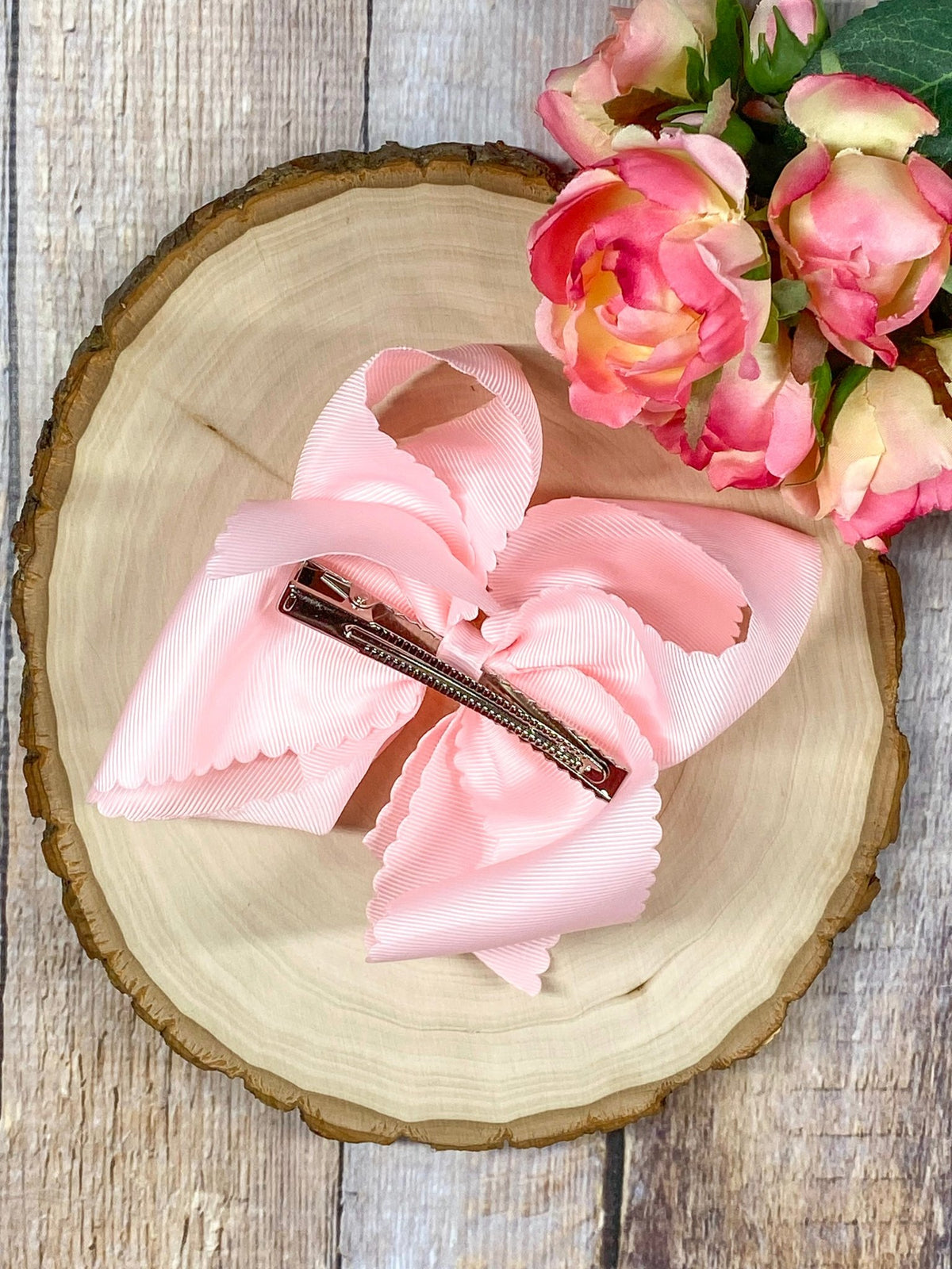 5.5 inch pink oversize scalloped hair bow with pink flowers