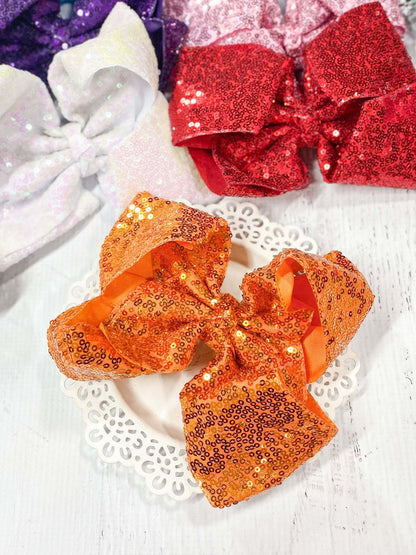 6.5 inch orange sequin Texas size hair bow