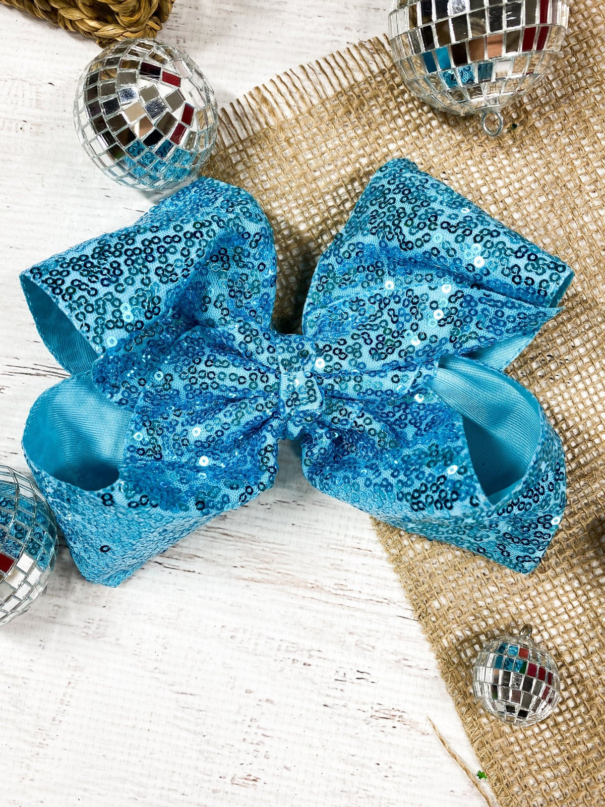 6.5 inch sky blue sequin Texas size hair bow