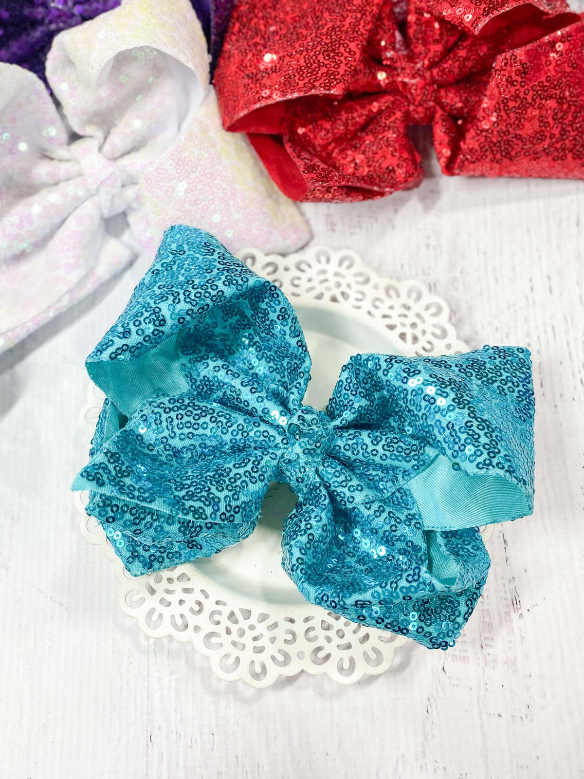6.5 inch teal sequin Texas size hair bow