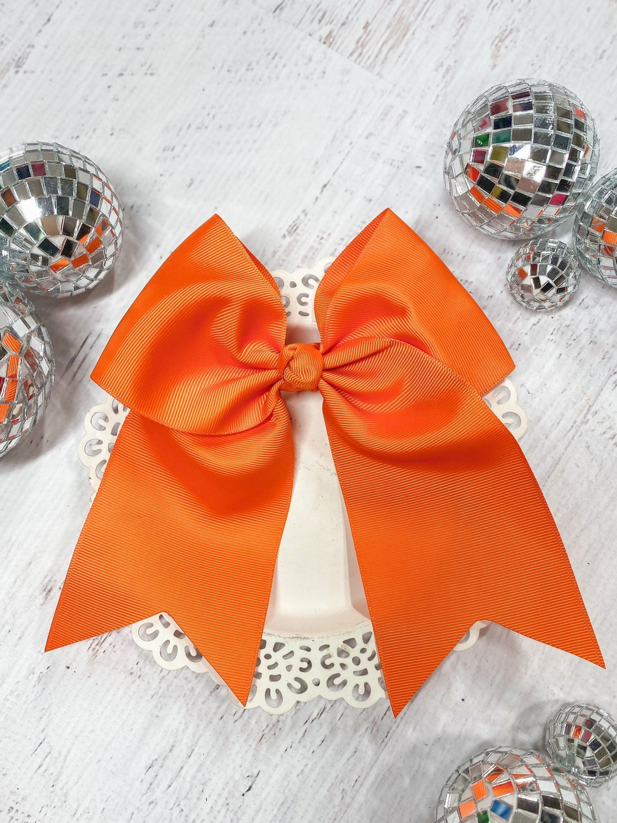 6 inch orange solid cheer bow on pony-o