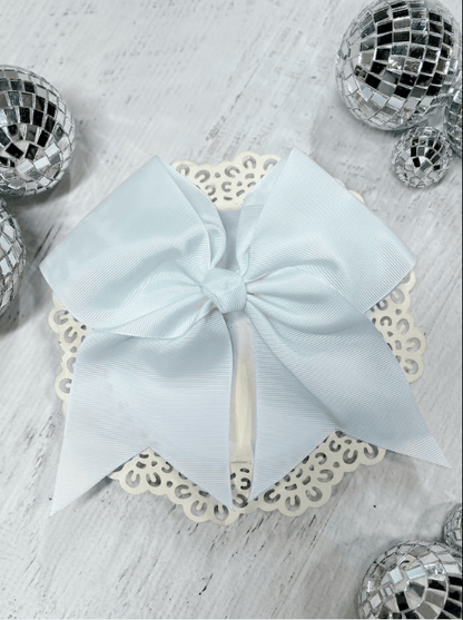 6 inch white solid cheer bow on pony-o